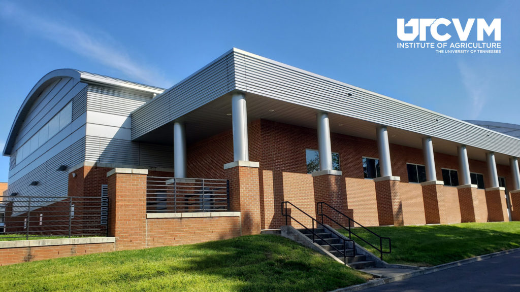 One of the UT Center for Veterinary Medicine buildings on the agricultural campus with the UT College of Veterinary Medicine logo in the upper right corner